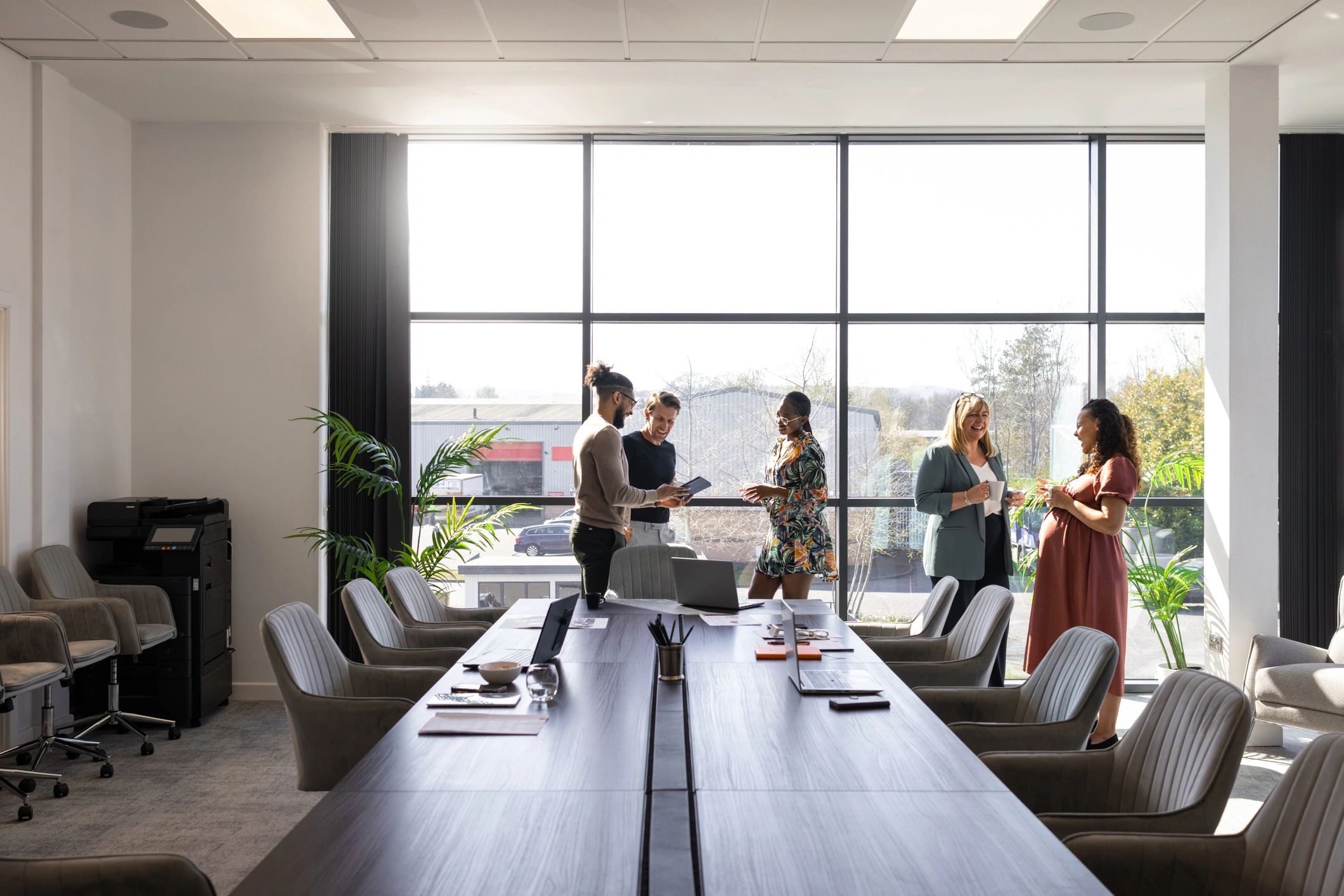 Business team discussing security services in an office