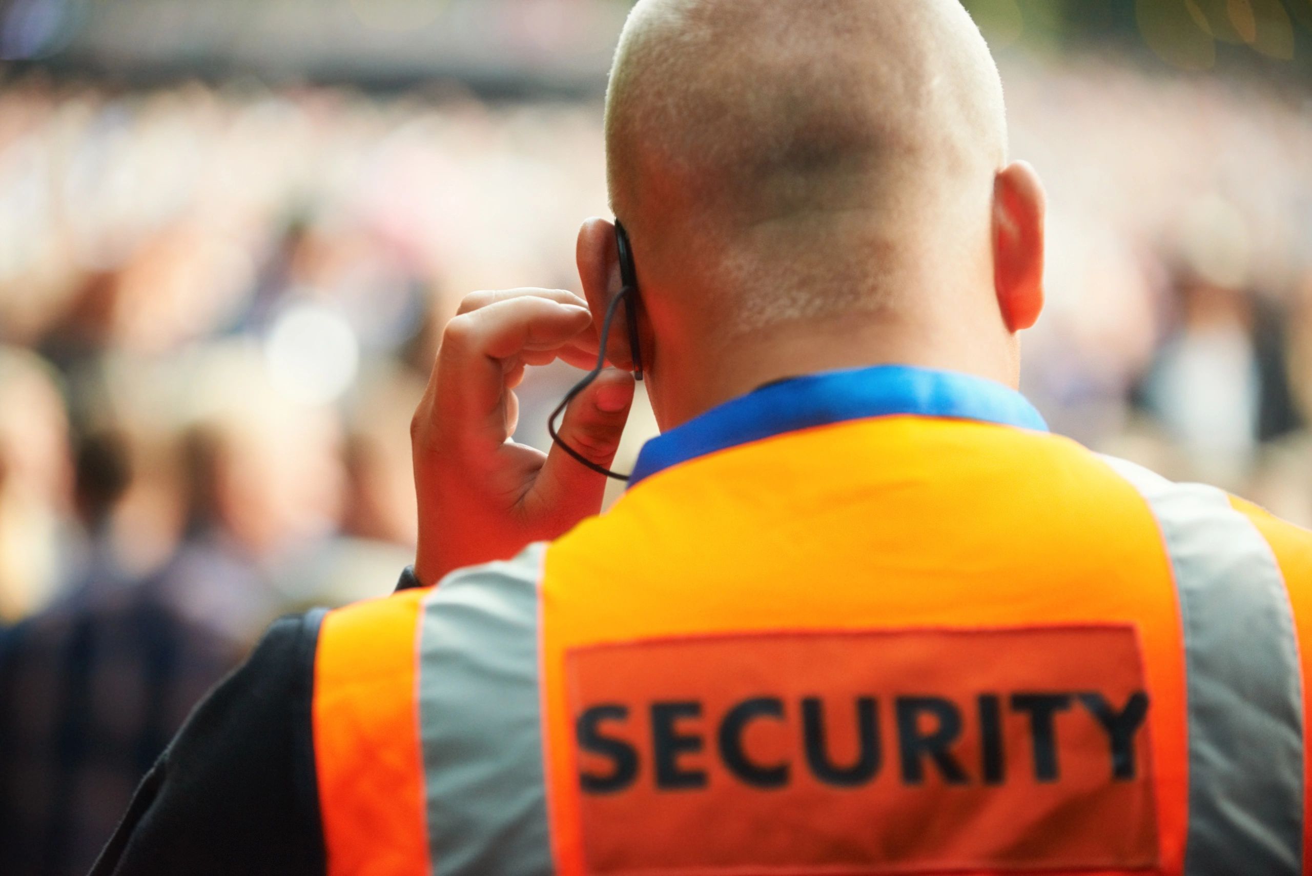 Security guard listening to a headset